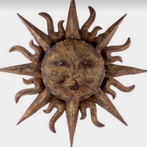 Sun with face metal wall decor